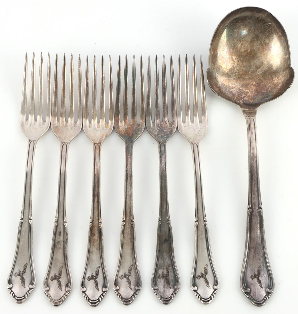 WWII GERMAN LUFTWAFFE FORK & SPOON LOT OF 7: WWII German Luftwaffe forks and spoon lot. 6 forks front stamped with the Luftwaffe eagle and DEP on the reverse. 1 large soup spoon Luftwaffe stamped on the front and DEP on the reverse. All in very 