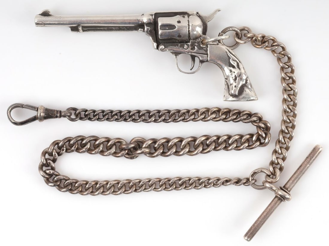 STERLING SILVER REVOLVER PISTOL WATCH FOB: Hallmarked "HP" on clip and some other worn hallmarks on bar. Total weight 80.9 grams. This lot has a reserve.