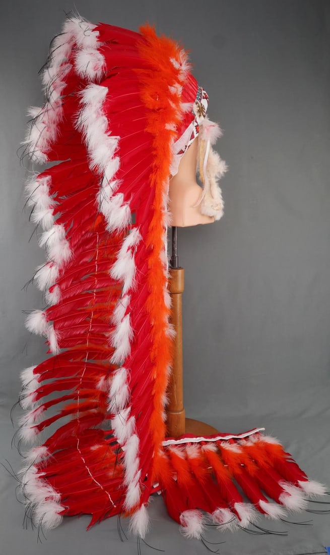 VINTAGE NATIVE AMERICAN CHIEFTAIN BEADED HEADDRESS: Vintage Native American Chieftain's headdress. Features red, black, white, and orange beads along with interior leather liner, bird feathers, and animal skin/fur. Approx. 60 inches in length. Good ove