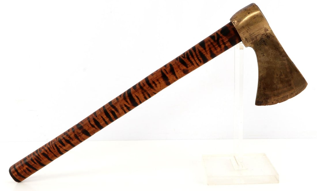 ANTIQUE NATIVE AMERICAN BRASS TOMAHAWK: Brass head with burnt wooden shaft. It measures 5 3/4 X 17 inches. J.S.H hand engraved on head. Very good condition.