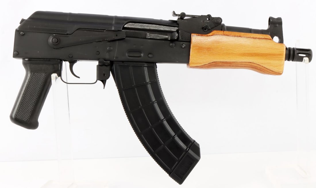ROMANIAN MINI DRACO 7.62X39MM SEMI AUTO PISTOL: Century Arms, Made in Romania, Mini Draco, chambered in 7.62x39mm, semi-automatic pistol with one 30-round magazine. Pistol features a threaded barrel, standard style AK Sights with front hooded and r
