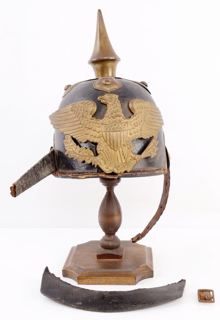 CA. 1850 U.S. ARMY SPIKE TAR BUCKET STYLE HELMET: Rare Mexican war U.S. spiked helmet, heavy wear but mostly intact, large Federal Eagle front, leather shell, damaged chin strap.