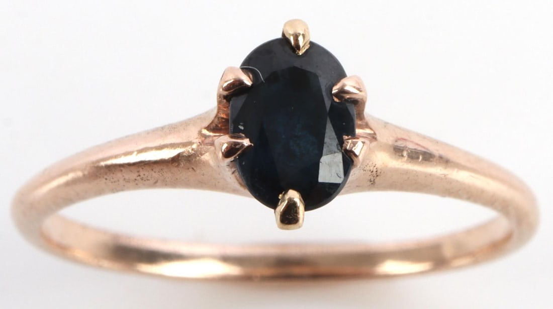 14K YELLOW GOLD SAPPHIRE SOLITAIRE VINTAGE RING: Acid tested for 14K. Total weight 1.7 grams. Sapphire measures 5.5x4.1 millimeters and is oval cut. Ring is a size 6.75 and is in very good condition without damage. This lot has a reserve.