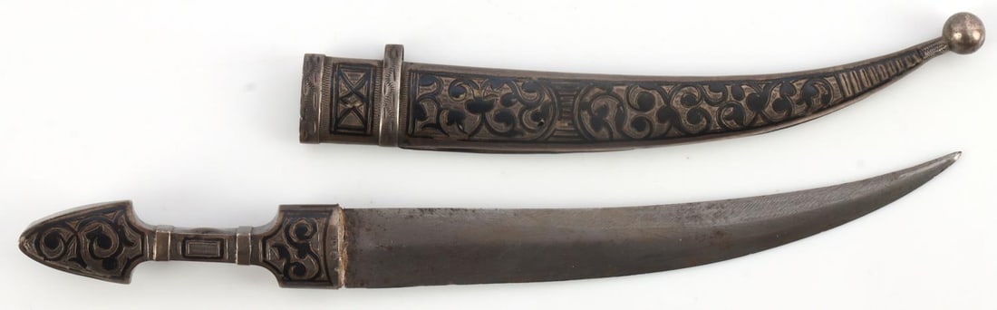RUSSIAN SILVER KOKOSHNIK HALLMARK NIELLO DAGGER: 19th century Russia Kokoshnik hallmarked on scabbard as well as grip, tight in the scabbard, good blade, measures 8 inches.