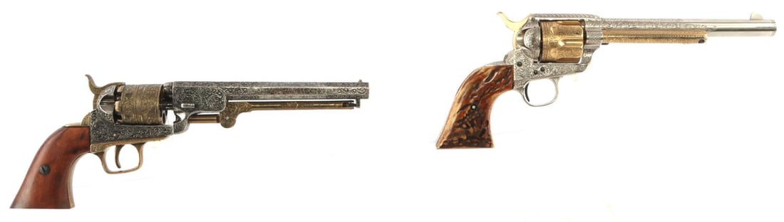 2 REPLICA SINGLE ACTION REVOLVERS FULL SIZE: The one with the horn grip does not engage, full size non firing replicas.