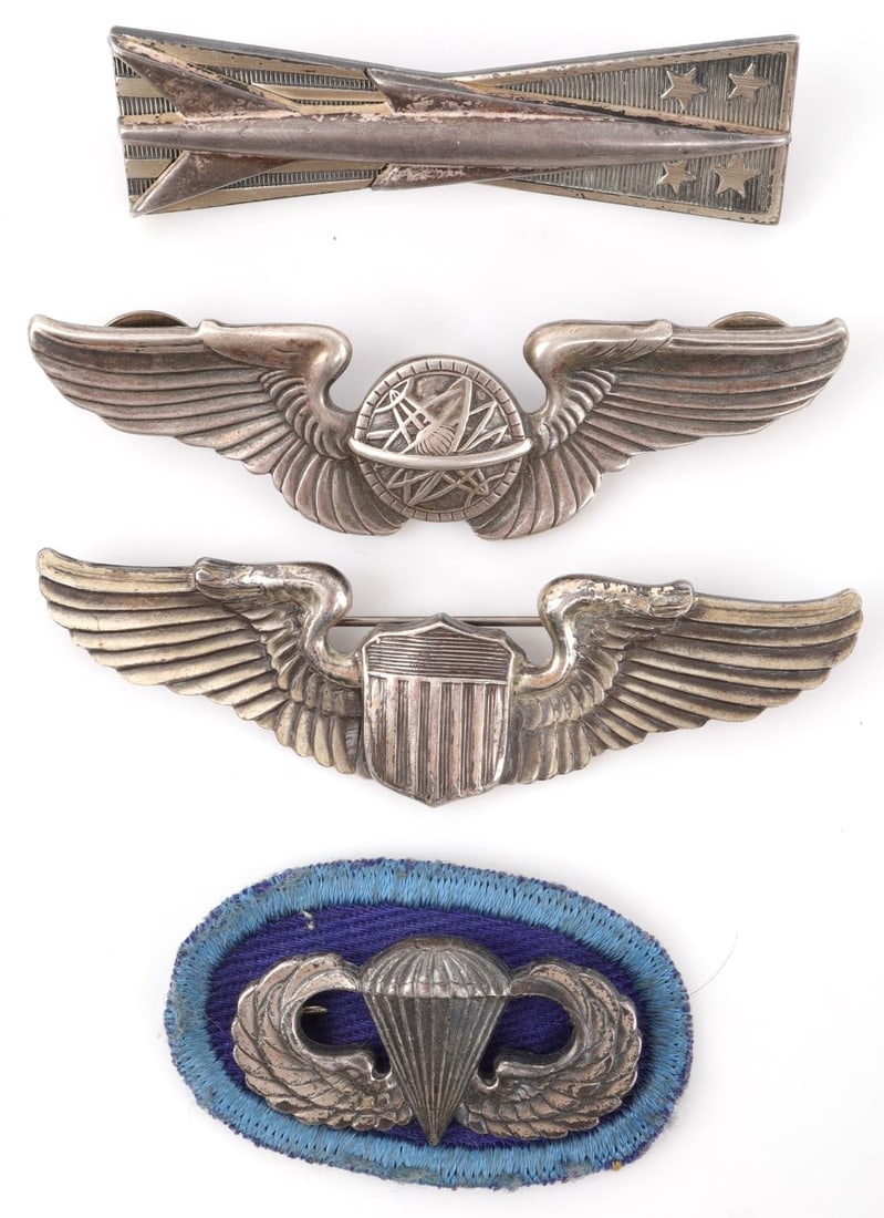 3 INCH NAVIGATOR PILOT & JUMP WINGS BADGE LOT OF 4: Lot of 4 WWII and post-war US Armed Forces badges. Includes clutch-back USAF Navigator Badge (3 inches, reverse stamped sterling), pin-back US Aviator Badge (3 inches, reversed stamped sterling, Amcra
