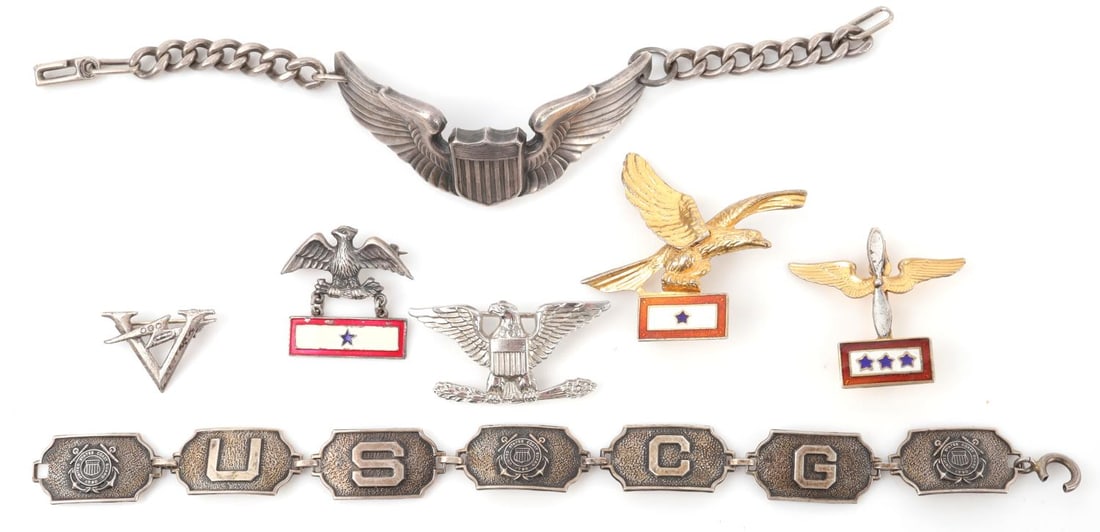 WWII US STERLING SILVER SWEETHEART JEWELRY LOT: Lot of 7. Includes a three-star Son in Service pin, a one-star Son in Service eagle pin, eagle pin with one-star Son in Service bar, USCG bracelet, silver eagle pin, victory pin with morse-code lightn
