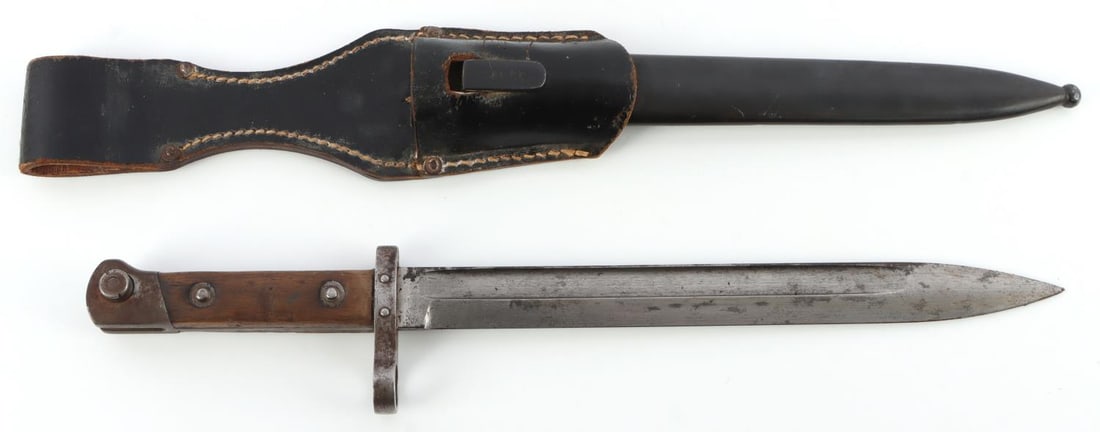 IMPERIAL GERMAN MAUSER M1871/84 BAYONET & FROG: Imperial German Mauser M1871/84 knife bayonet. Ricasso stamped "MD." Includes leather frog stamped "Peltzer & Co Kirn/N 1942." Both in good condition. Blade and handle have typical patina and scratche