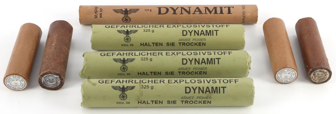 8 WWII GERMAN REICH MODEL TRENCH DYNAMITE LOT: NOT REAL EXPLOSIVES. Lot of eight (8) post-war display pieces WWII German Reich model Trench Dynamite. Wooden blocks wrapped in Reich packaging. Lot features 325 grain "GEFAHRLICHER EXPLOSIVSTOFF", an