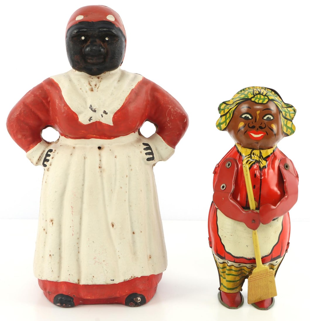 LINDSTROM SWEEPING WIND-UP TOY & AUNT JEMIMA BANK: Black Americana lot of two (2) items. 9-inch Lindstrom mechanical "Sweeping Mammy" tin litho wind-up toy and 11-inch cast iron Aunt Jemima bank. Wind-up toy functional. Both in good condition, with so