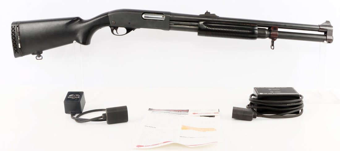 REMINGTON 870 W/ 1980'S INTEGRATED LASER PRODUCTS: Remington 870 Wingmaster with 1980's modification by Laser Products for integrated laser in shotgun tube. Battery stored in stock, laser emits from end of modified shotgun tube when trigger is pulled 