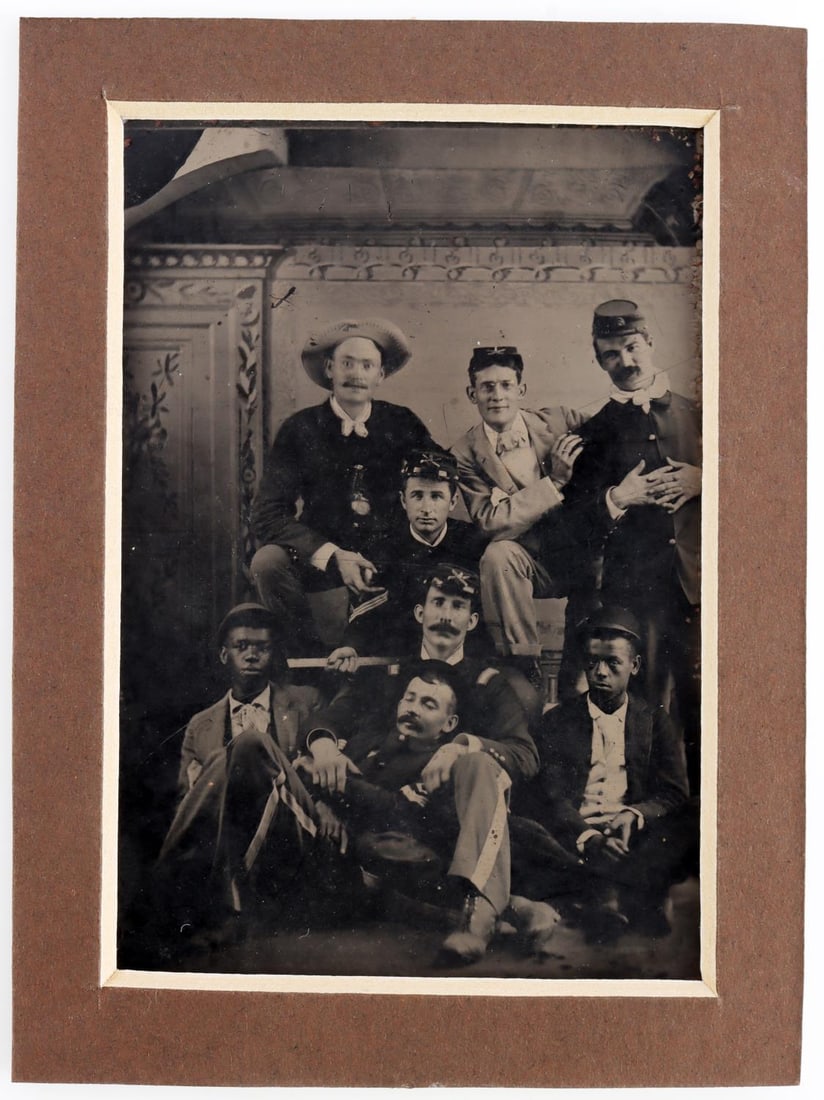 US CIVIL WAR BLACK & WHITE UNION SOLDIERS TIN TYPE: Tin Type depicting 6 white Union soldiers posing with two black civilians. Measures 3 3/8 inches tall by 2 5/16 inches wide. In good condition with some wear at the very edges.