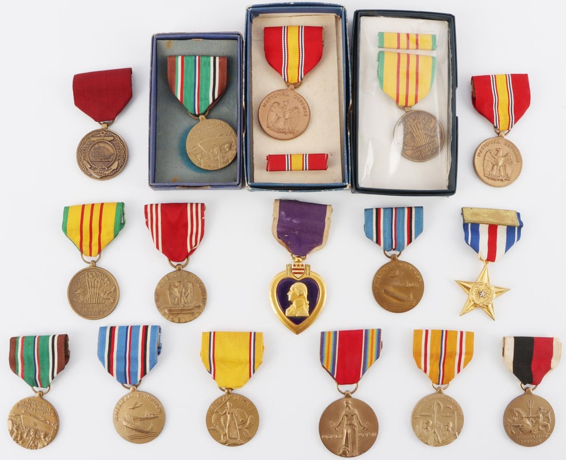WWII US SERVICE AWARD MEDALS COLLECTION LOT OF 16: Lot of SIXTEEN (16) US military service award medals. Primarily WWII. Includes cased 1967 National Defense Medal, cased Vietnam Service medal and cased European African Middle Eastern Campaign Medal. 