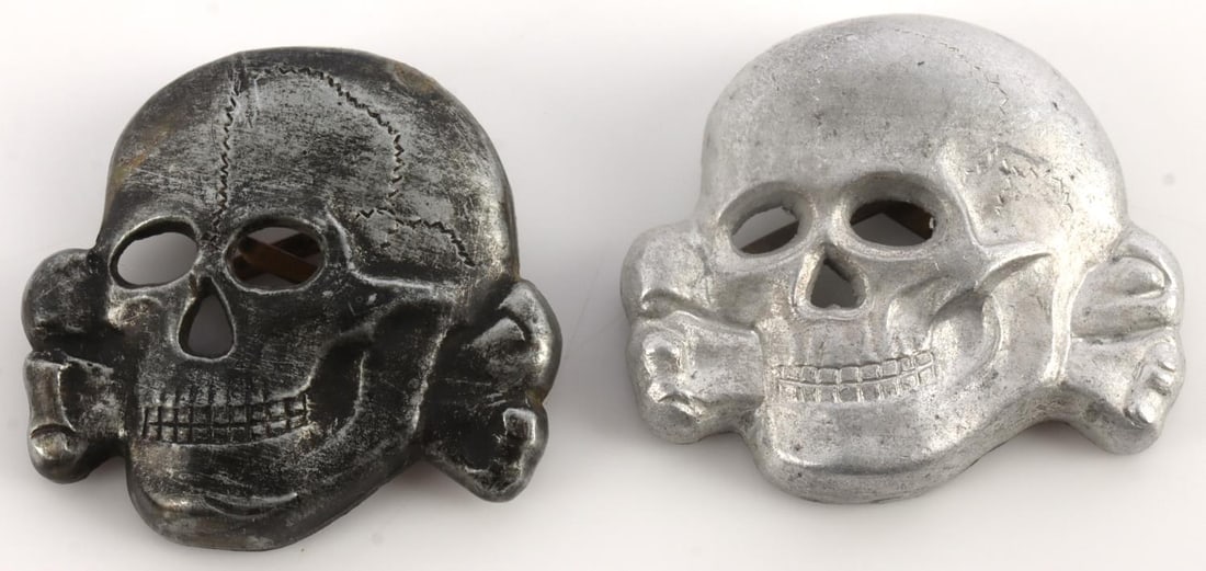 2 WWII GERMAN SS TOTENKOPF VISOR EAGLE & SKULL: The lighter color one is SS RZM 380/40 stamped reverse, the darker is RZM M1/24 stamped. Both very good original condition.