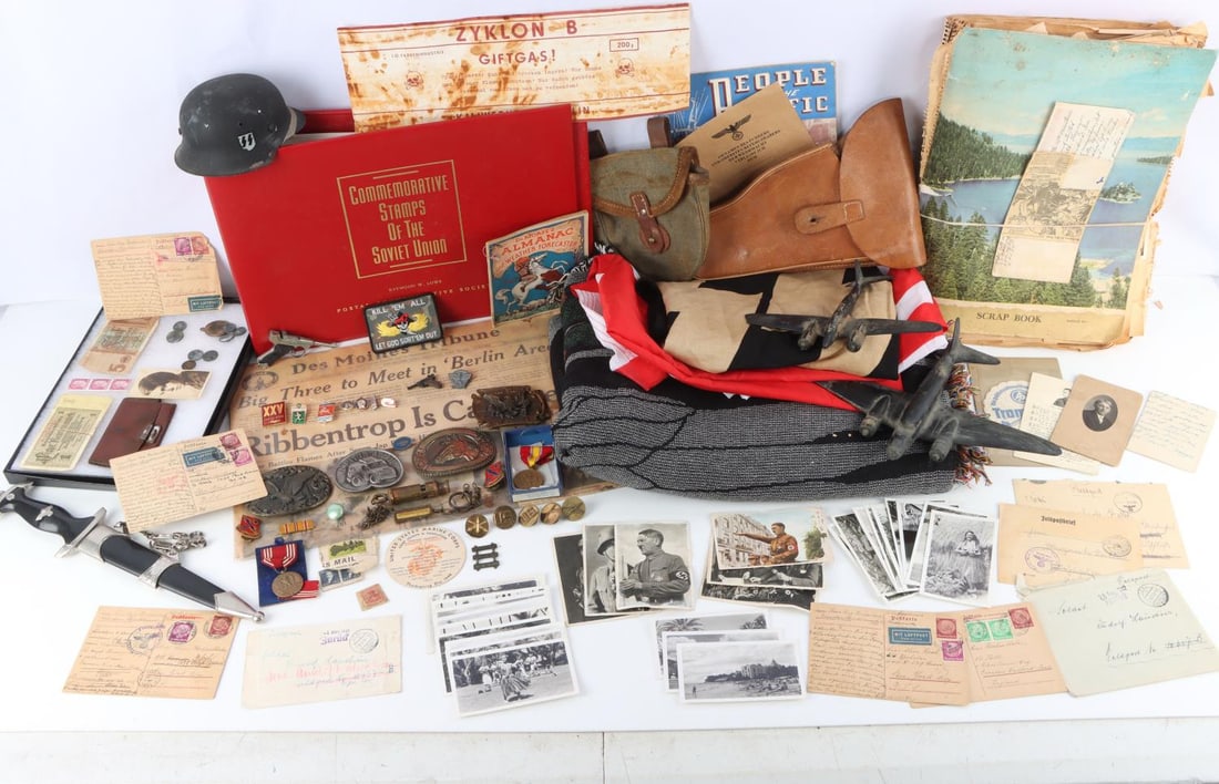 WWII GERMAN U.S SOVIET UNION MILITARY COLLECTIBLES: As photographed and sold as is, big and varied grouping. scrap book, USSR stamps and more,