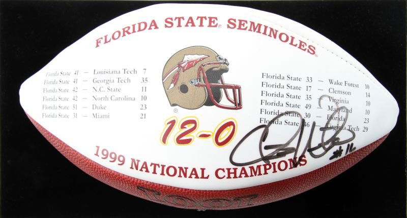 CHRIS WEINKE SIGNED FSU 1999 NCAA CHAMP BALL COA: Heisman Trophy winner Chris Weinke, #16 FSU, signed "Florida State Seminoles 1999 National Champions" Wilson ball. with COA provided by Nikco Sports limited edition of 5000. In very good condition wit