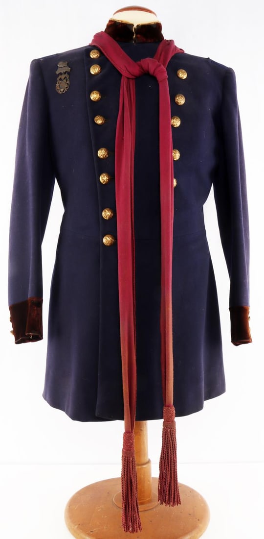 METRO GOLDWYN MEYER MGM TAGGED ARMY TUNIC PROP: Indian wars tunic nd sash with Buffalo 1897 exposition medal attached . The MGM tag is in the inside left pocket, some mothing, wear to collar and sleeves, missing the epaulettes. Remains in good coll