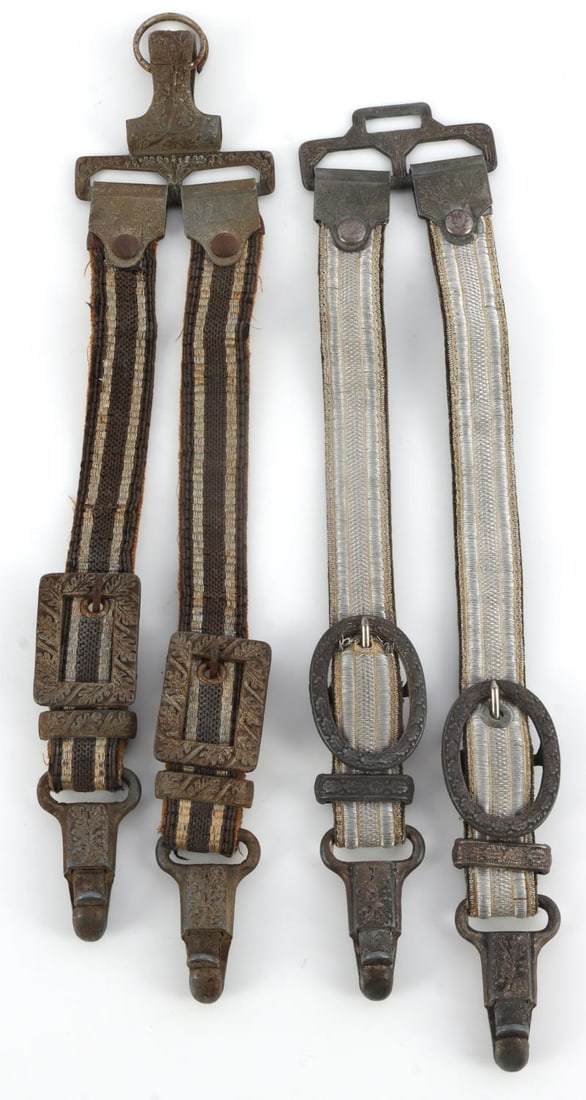 WWII GERMAN REICH LUFTWAFFE & HEER DAGGER HANGERS: Lot of two (2) WWII German Reich deluxe dagger hangers including a Luftwaffe dagger hanger and a Heer Army dagger hanger. Luftwaffe hanger features zinc construction except for steel grommets and alum