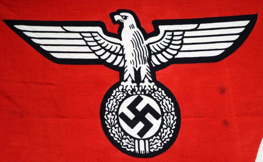 WWII GERMAN THIRD REICH SERVICE FLAG: Reich Service flag featuring swastika flanked by a Reichsadler. Wool construction. Ink stamped 1.5 X 2.5 on hoist. 5 X 8.2 feet. Very good condition. Non-fluorescing. This lot has a reserve.