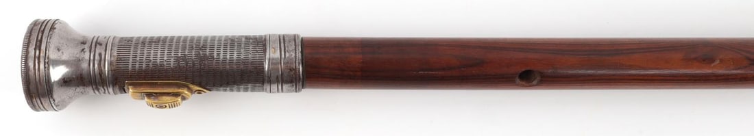 ANTIQUE FLASH LIGHT MOUNTAINEERING WALKING STICK: The flashlight is complete, but not tested, smooth and well crafted, hard wood shaft, to pointed tip. Rare example system cane. 36 inches.