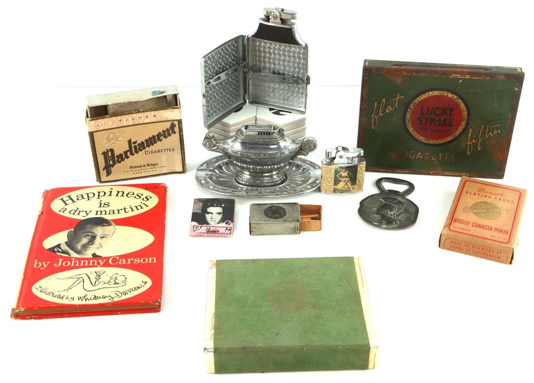 SMOKERS WELCOME 12PCS VINTAGE BAR EPHEMERA: Lot of 12. Includes Lucky Strike Flat Fifties cigarette tin, Parliament cigarette box, pin-up girl lighter in box, Elvis Presley matches, Ronson Mastercase combination lighter and cigarette case, meta