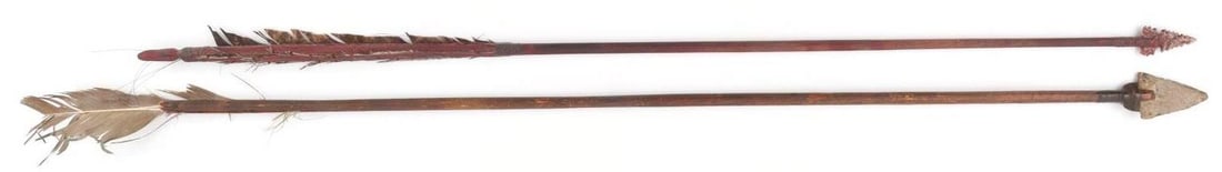 STONE TIPPED HIGH PLAINS ARROW LOT OF 2: Lot of 2 vintage arrows. The first is a 27-inch High Plains arrow, dyed red, with a notched stone tip measuring 1.5 inches long. The second arrow is from the collection of Jim Ritchie and measures 27 