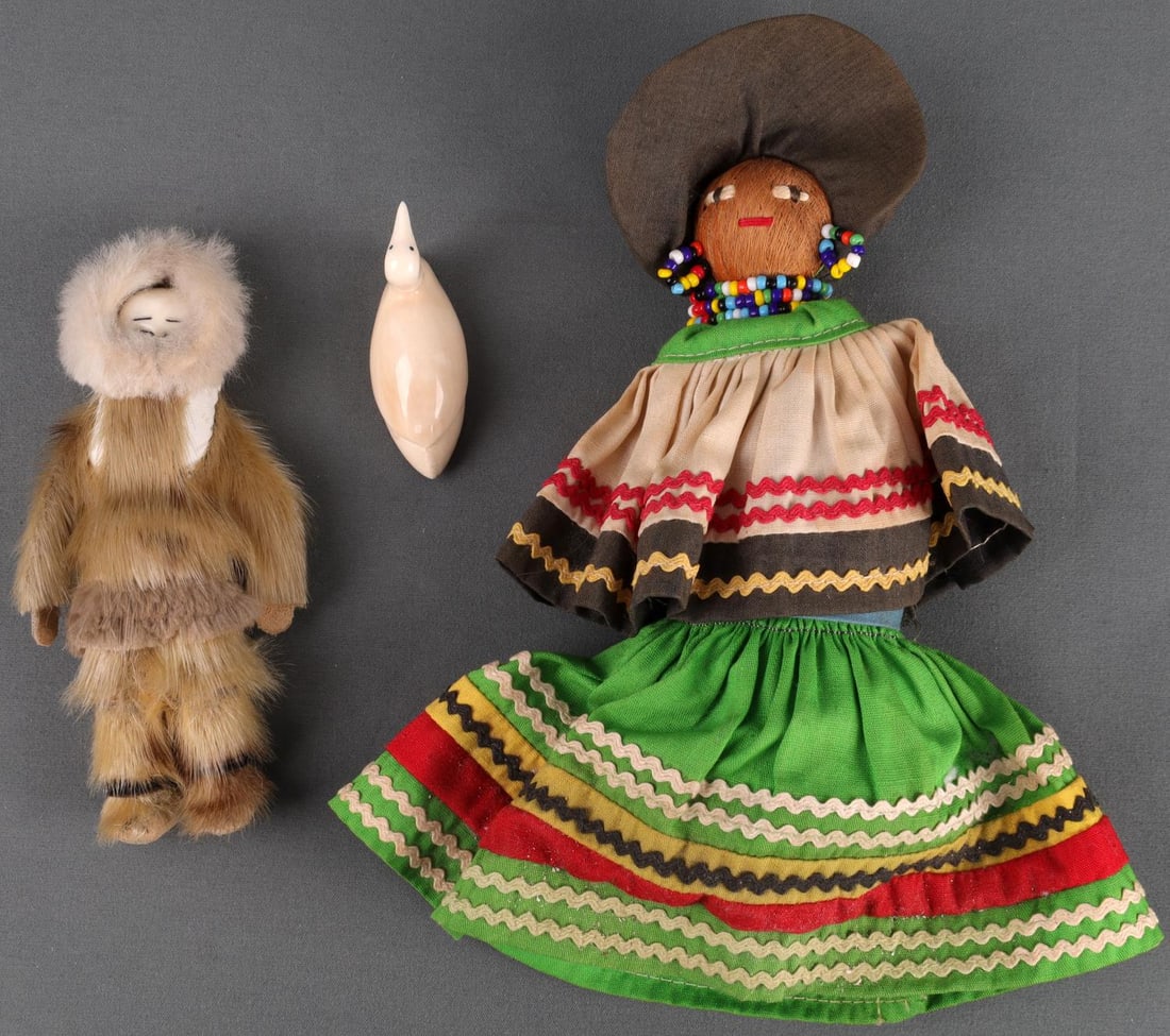 EDDIE LYND CARVING NATIVE AMERICAN DOLL LOT OF 3: Eddie Lynd bone carving of a swan. Size 2 1/5 X 1 1/4 inches. Signed and no chipping of cranking. Inuit Eskimo fur doll. Porcelain face and natural fur hand made. Size 5 1/4 X 2 3/4 inches. Great vint