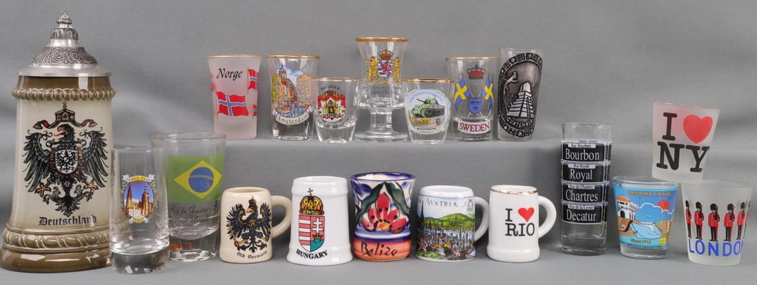 18 SHOT GLASSES FROM AROUND THE WORLD BEER STEIN: 18 Shot glasses from around the world and 1 beer stein by King in Germany. Shot glass are from: NY City, New Orleans, Belize, London, Norway, Amsterdam, Sweden, Old Germany, Guatemala, Panama Canal, H