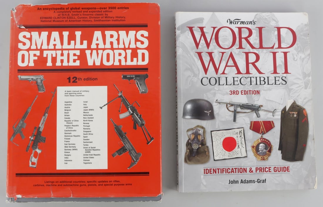 LOT OF 2 BOOKS SMALL ARMS & WWII COLLECTIBLES: Small Arms of the World 12th Edition Edward Clinton Ezell. A completely new and revised version of the classis work by W. H. B. Smith. Warman's World War II Collectibles 3rd Edition, Identification & 