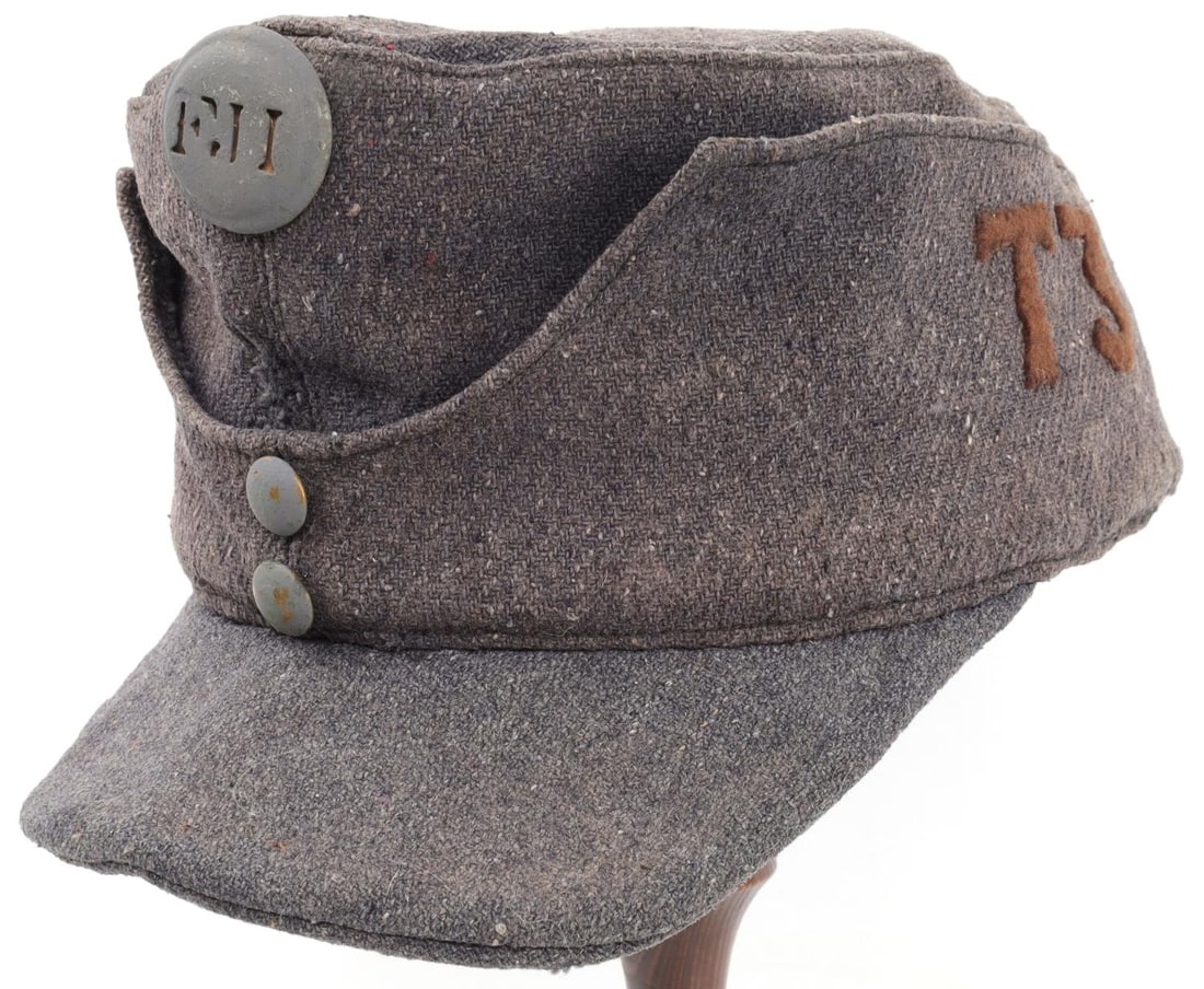 WWI AUSTRIAN HUNGARIAN ARMY K.U.K. FIELD CAP HAT: WWI Austrian Hungarian Army field cap. Grey wool construction and stamped M. D. 2 1917. Hand stitched T 3 on the left side. Overall, very good condition. Unauthenticated and sold as is.