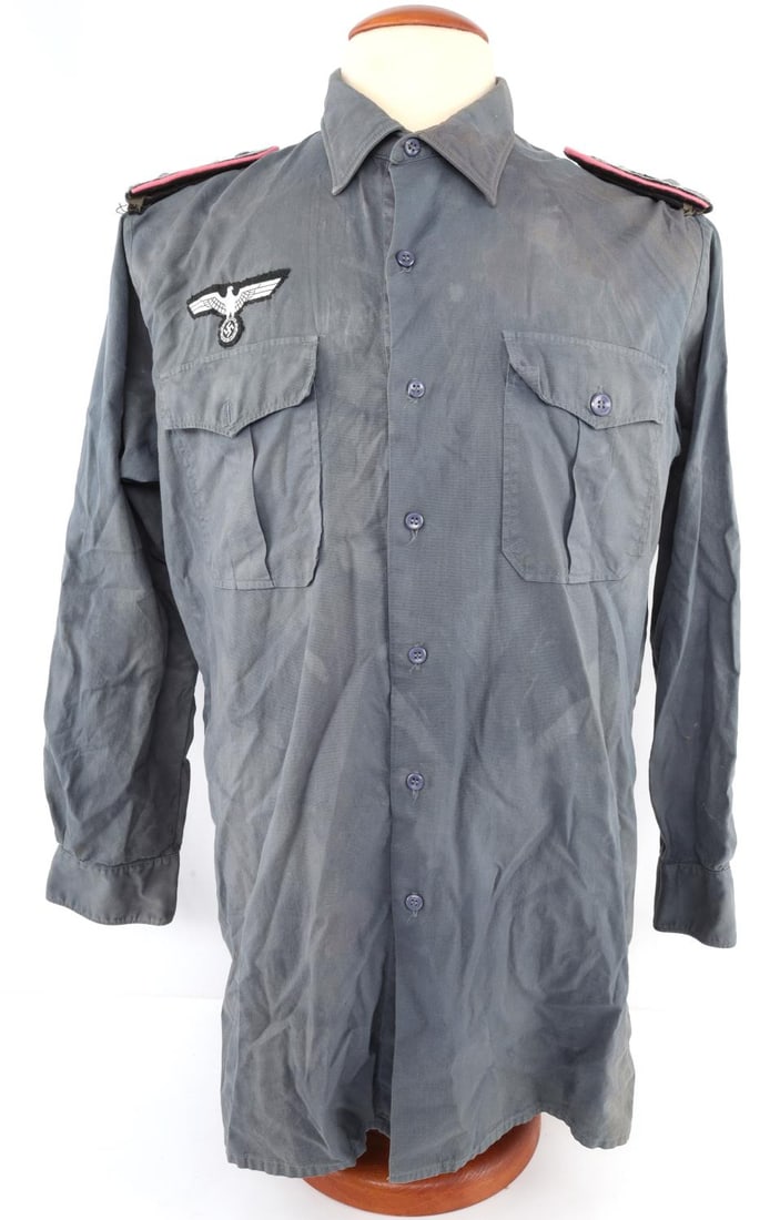 WWII GERMAN REICH HEER ARMY PANZER COMBAT SHIRT: WWII German Reich Heer army combat shirt. Features Heer breast eagle patch and panzer shoulder boards for a non-commissioned Master Sergeant. Interior of the shirt features a manufacturer stamp and is