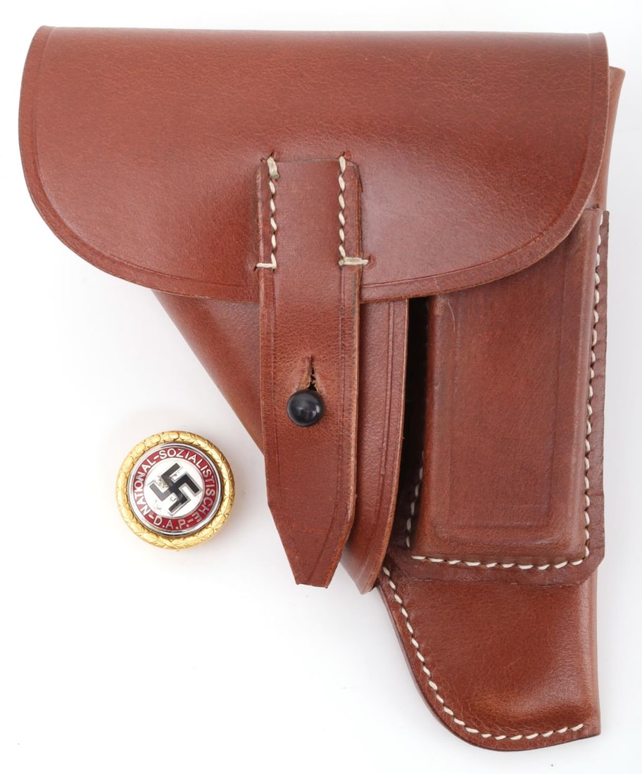 WWII GERMAN GOLD PARTYT BADGE & GXY BROWN HOLSTER: WWII German Gold Party badge. The front reads ?National ? Sozialistische ? D. A. P.?. There is a swastika in the center. The disc is surrounded by a round oak leaf wreath. The reverse side is stamped 