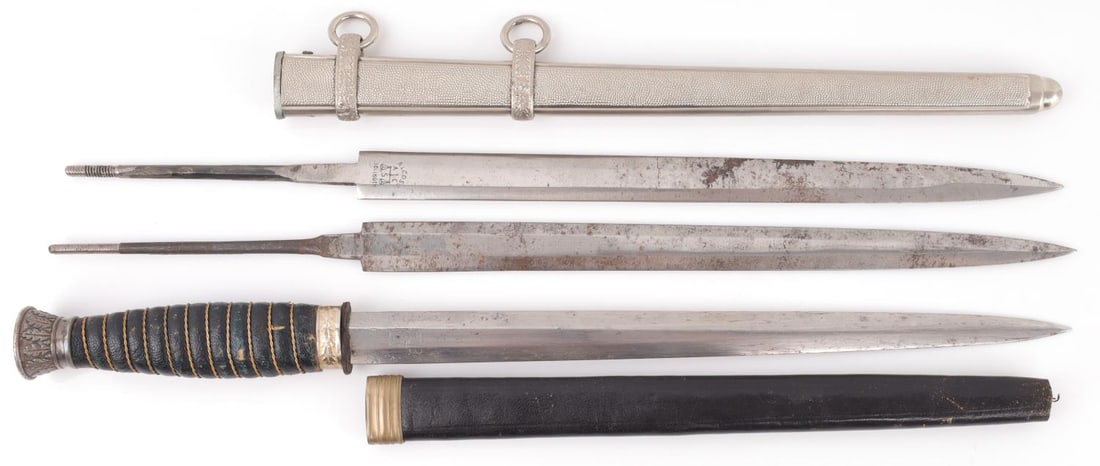 LOT OF ASSORTED WWII GERMAN DAGGER PARTS: Small dagger and scabbard with "Eickorn. Solingen" blade, one (1) scabbard, and two (2) dagger blades (one "Solingen 1939", and one "Alcoso Solingen"). . Unauthenticated, sold "as is." This lot has a
