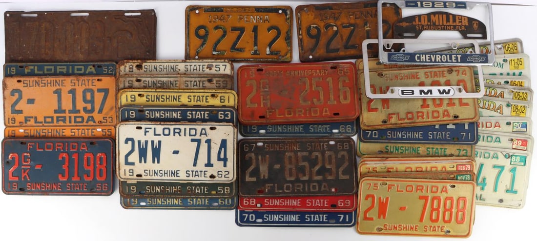 VINTAGE FLORIDA LICENSE PLATE & TOPPER LOT OF 56: Lot of 56. Includes 3 vintage plate toppers and 53 license plates. Oldest plates are 1926 FL and 1947 PA. Dozens of Florida plates from the 1950s, 1960s and 1970s. Several 1965 FL 400th Anniversary li