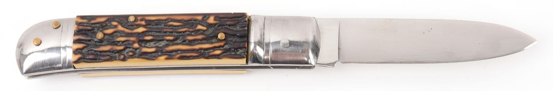 HALLER 420 ROSTFREI AUTOMATIC KNIFE: Steel blade with composite stag groups. Measures 7 3/4 inches. Very good condition.