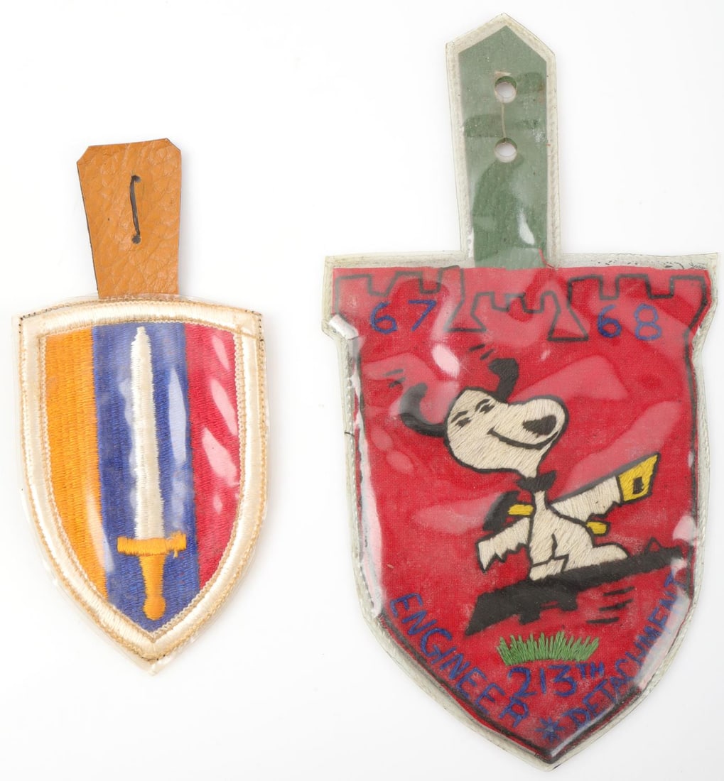 VIETNAM 213TH ENGINEER DETACHMENT IN COUNTRY PATCH: 2 Patches as photographed, 213 measures without tag 3 1/4 x 4 1/4, with strap 6 1/2 inches, both patches are very good original condition.