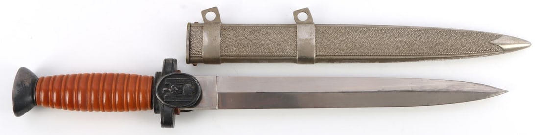 WWII GERMAN RED CROSS LEADERS DAGGER: WWII German Red Cross leader's dagger. The Red Cross was a German organization made up of mostly volunteers for civilian aid. Dagger comes with sheath but does not have any cords. Blade length is 9 1/