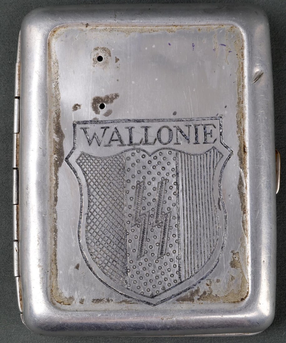 WWII GERMAN THIRD REICH SS CIGARETTE CASE: SS cigarette case inscribed with 'Wallonie.' Aluminum. 3 X 4 inches. Very good condition.