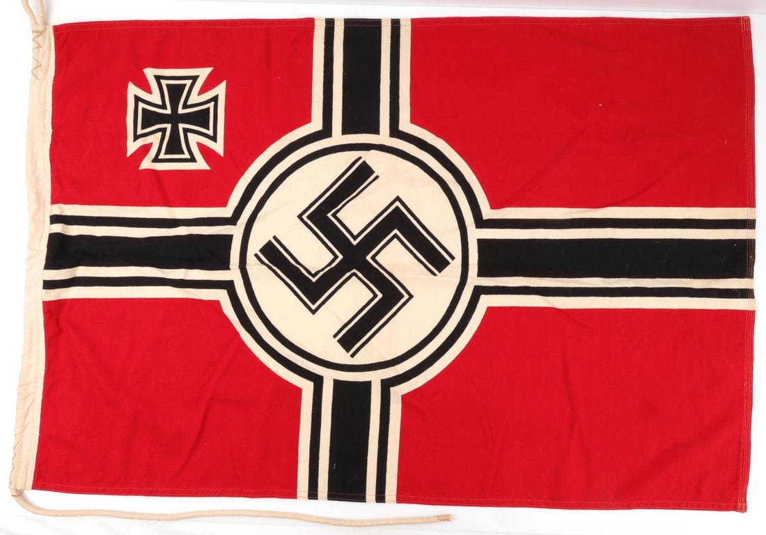 WWII GERMAN REICH KRIEGSMARINE BATTLE FLAG 60X90CM: WWII German Reich Kriegsmarine Battle Flag. Features a double-sided single piece construction. The hoist edge is trimmed in white, tunnel looped, cotton and rayon blend and is marked, "REICHSKRIEGSFAH