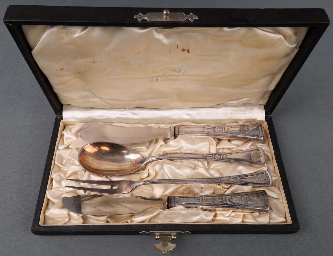 WWII GERMAN THIRD REICH CASED WAFFEN SS SILVERWARE: Four (4) pieces of WWII German Third Reich Waffen SS silverware with case. Each utensil handle is marked with SS runes and a monogram. Knife handles are stamped "60" on reverse. Case has SS runes on l
