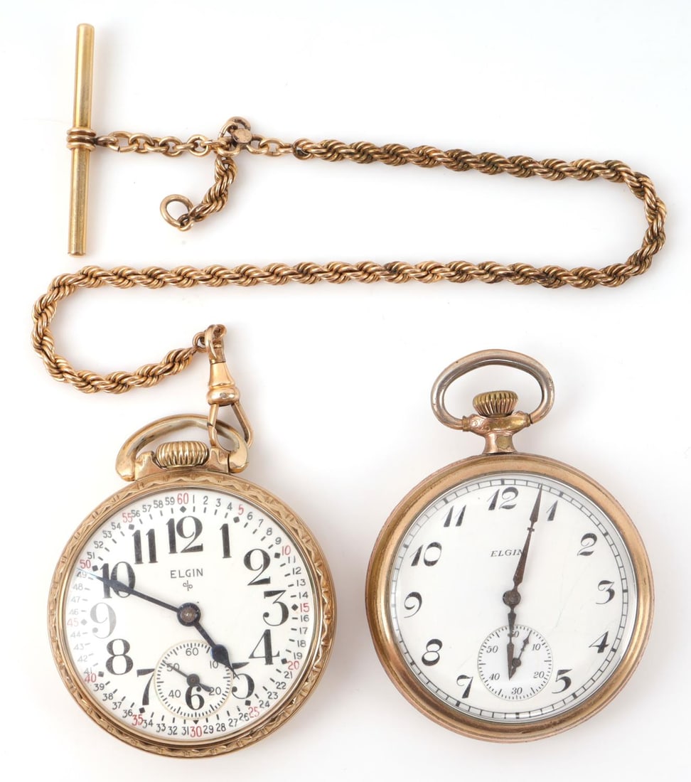 2 ELGIN POCKET WATCH LOT 573 RAILROAD & 313: Railroad Grade S/N H718284, with gold filled fob, model 20, production 1950, size 16 S, 17 jewel. The Second grade 313, model 7, production 1926, size 16S, 15 jewel. Each watch starts and holds, each