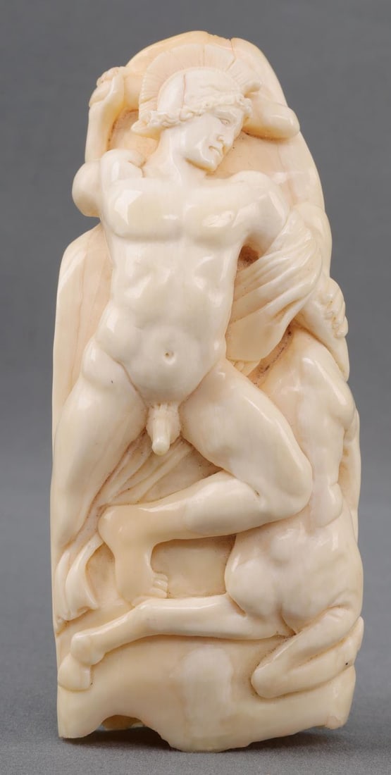 ANTIQUE IVORY DEPICTION OF HERCULES & NESSUS: Antique ivory depicting Hercules fighting Nessus. 4.5 X 2 inches. Very good condition. No international shipping. Know your state's laws prior to bidding.