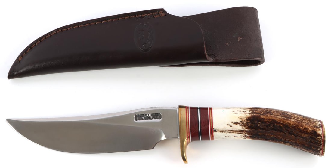 RANDALL MADE KNIFE MODEL 27 STAG GRIP: Steel blade with stag grip. Blade measures 5 3/4 inches. Grip measures 4 1/2 inches. Brass finger-guard and butt cap plate.