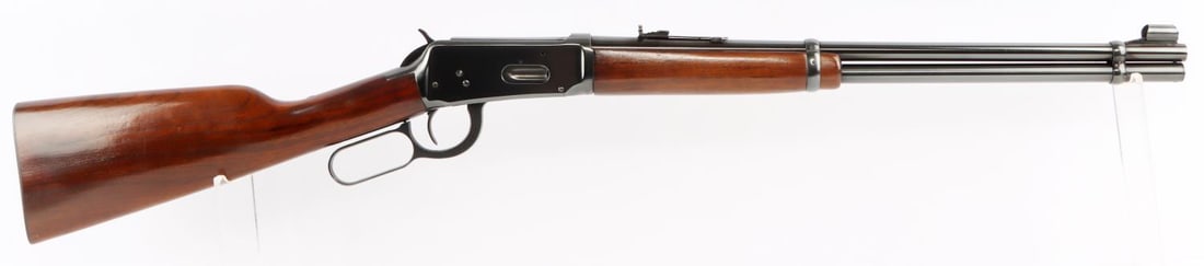 NEAR MINT 1958 WINCHESTER MODEL 94 CAL .30-30: Winchester Model 94 lever action rifle. Cal .30-30 Winchester. 20-inch barrel. Manufactured 1958. Excellent condition. Blued steel and wood stock are unmarred. Bore is very bright. Surface of lever is