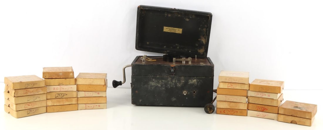INSTRUCTOGRAPH MACHINE & TAPES LOT OF 29: This Instructograph machine is an early electromechanical playback device used for learning Continental or American Morse code. Several different models were manufactured by the Chicago-based Instruct
