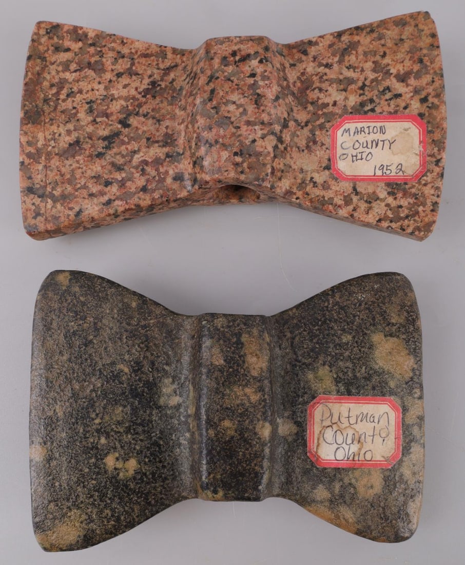 LOT OF 2 NATIVE AMERICAN GRANITE BANNERSTONES: Lot of two (2). Native American bannerstones made from granite. Each shaped like a double-bladed axe head. No chipping or cracking. Both in very good condition.