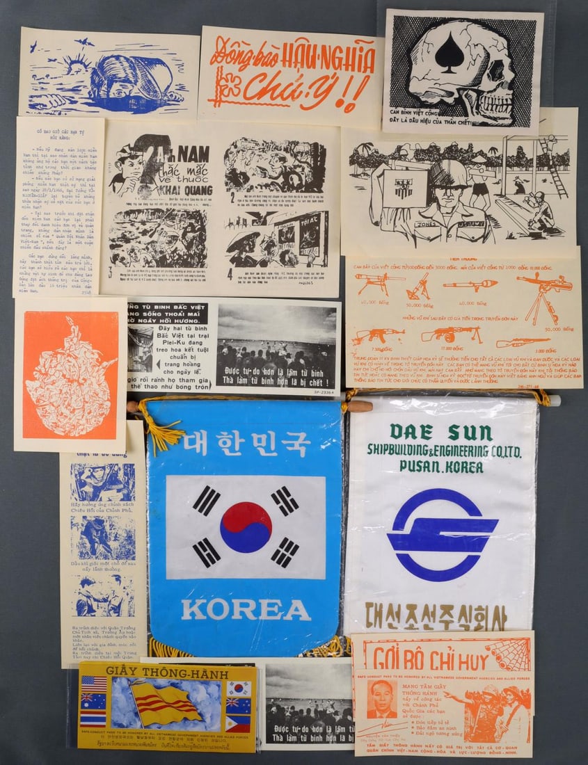 VIETNAM VIETCONG DOCUMENTS & RELATED EPHEMERA: Interesting grouping includes a rare safe conduct pass and related items, a cloth Shipbuilding pennant.