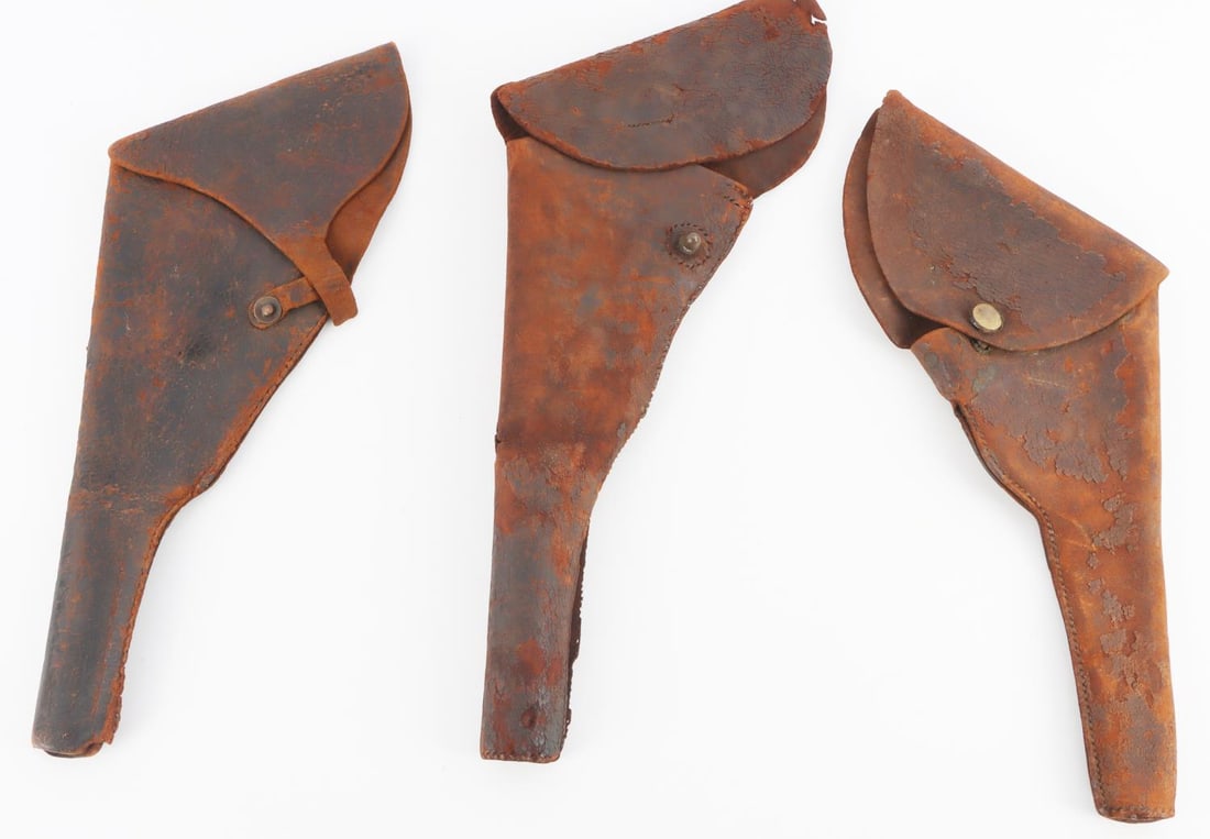 US CIVIL WAR LEATHER COLT ARMY HOLSTER LOT OF 3: Lot of three (3) pieces. Holsters measure, from top to bottom, 13.5 inches, 14 inches and 16 inches, respectively. They are in heavily worn condition, although the leather is pliable. Stitches have be