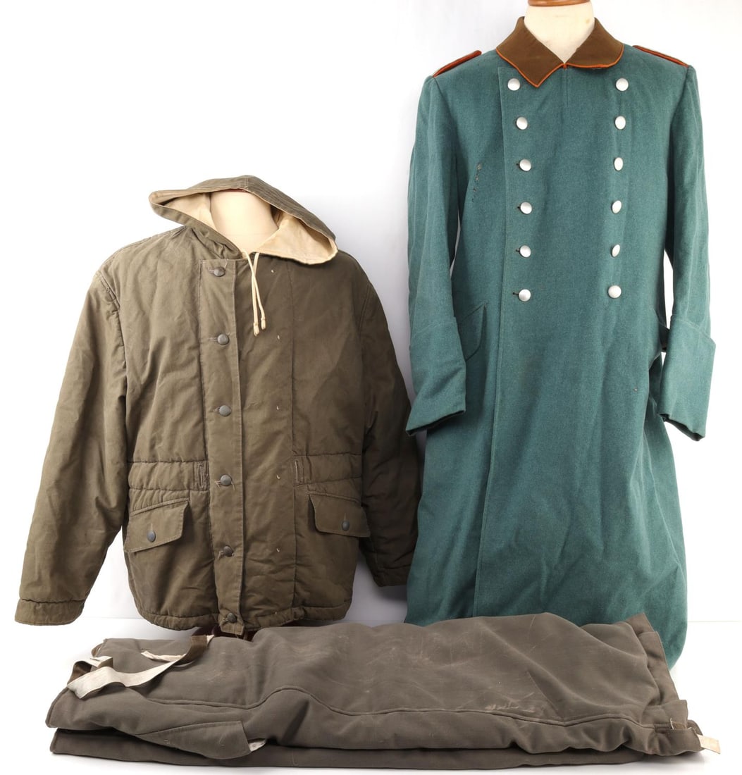 WWII GERMAN POLICE LONG COAT PARKA & TROUSER SET: WWII German Police / Feldgendarmerie long coat, men's large. Some damage to the collar. WWII German Mouse Grey Parka and Trouser set, mens small. None are named and in good condition. Unauthenticated 