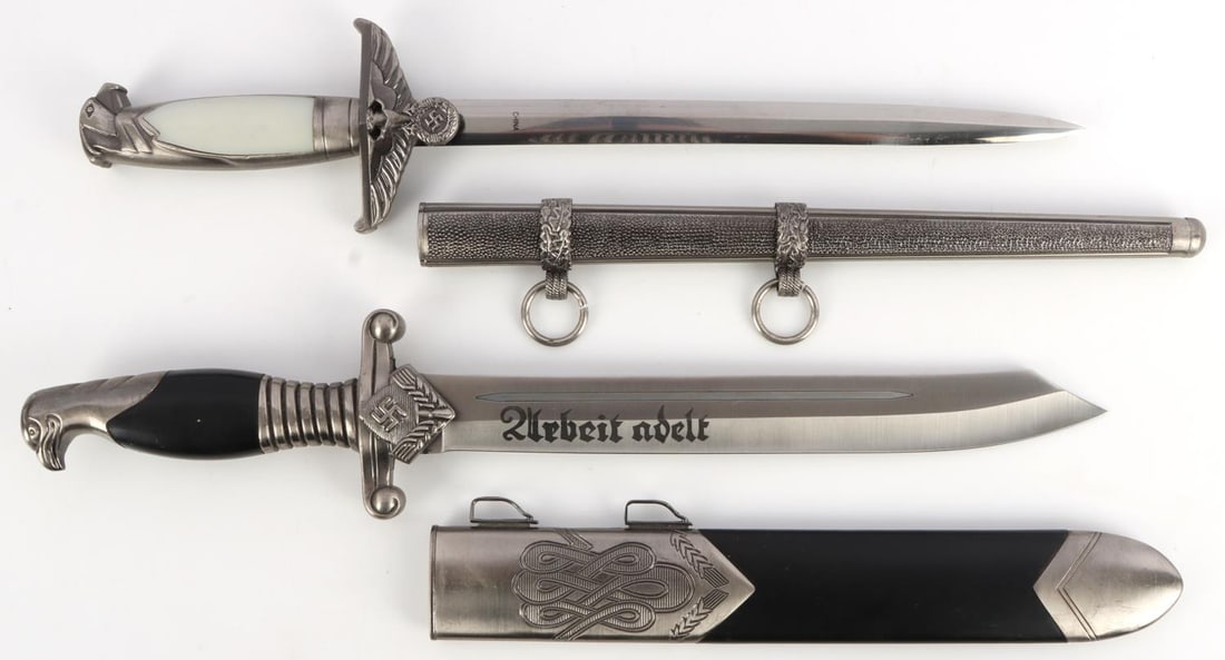 WWII GERMAN THIRD REICH DAGGER LOT OF 2: WWII Nazi German Third Reich Teno style dagger, 10 inch blade and total of 15 1/4 inches. 1 WWII German Diplomats Dagger. Blade length 10 inches and total is 15 inches. Both are in very good condition